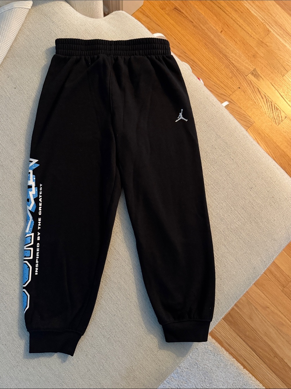 Jordan Black Sweatpants with White Jumpman and Blue Side Graphic